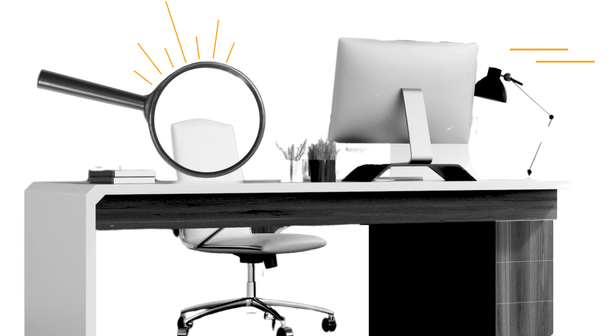 A magnifying glass zooming in on an executive desk.