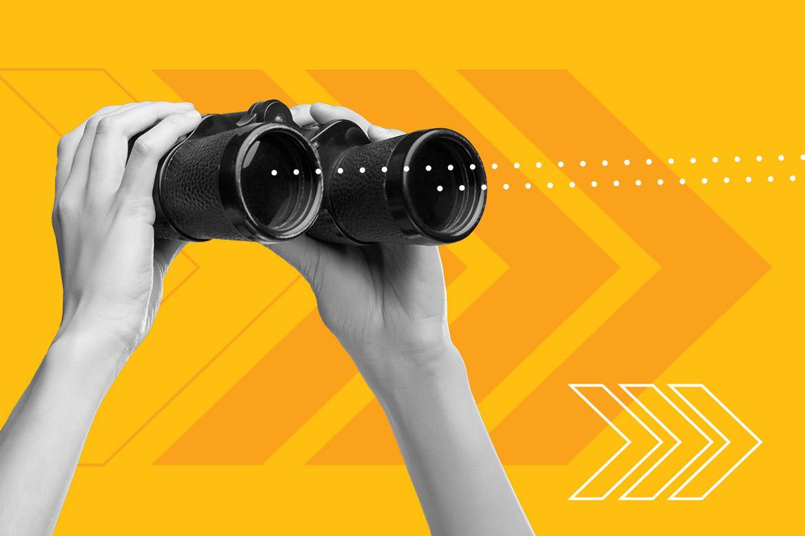 Someone holding up binoculars.