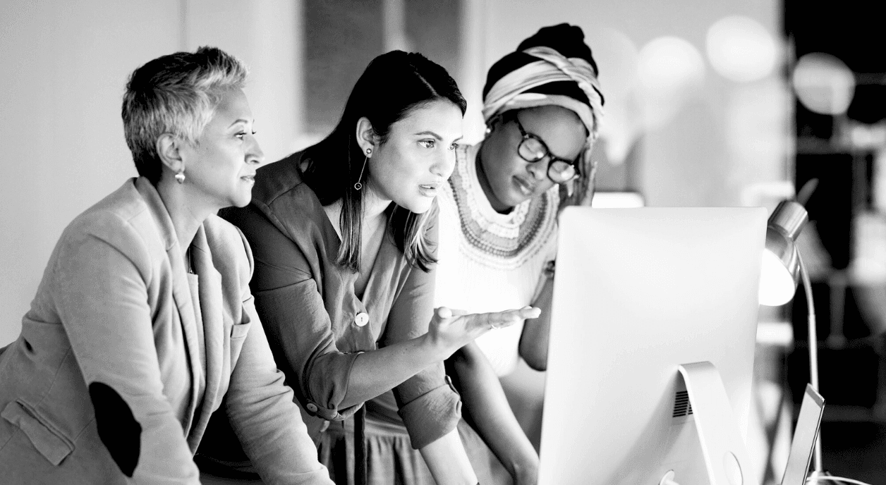 Three people look at AI tools.