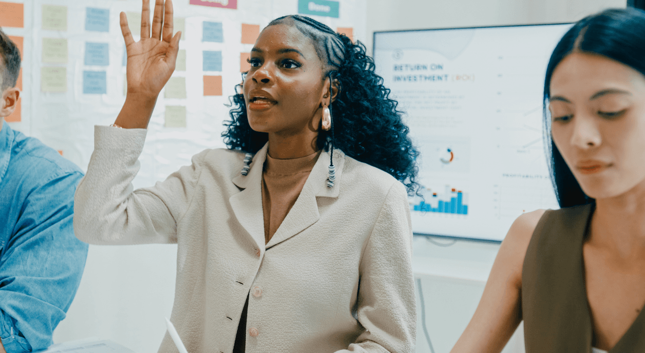 A woman asking a question about AI equity.