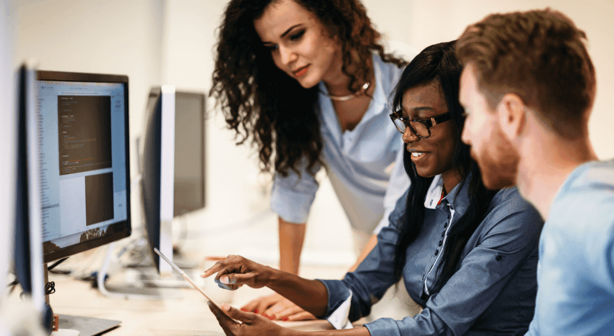 Nonprofit colleagues updating their digital profile.