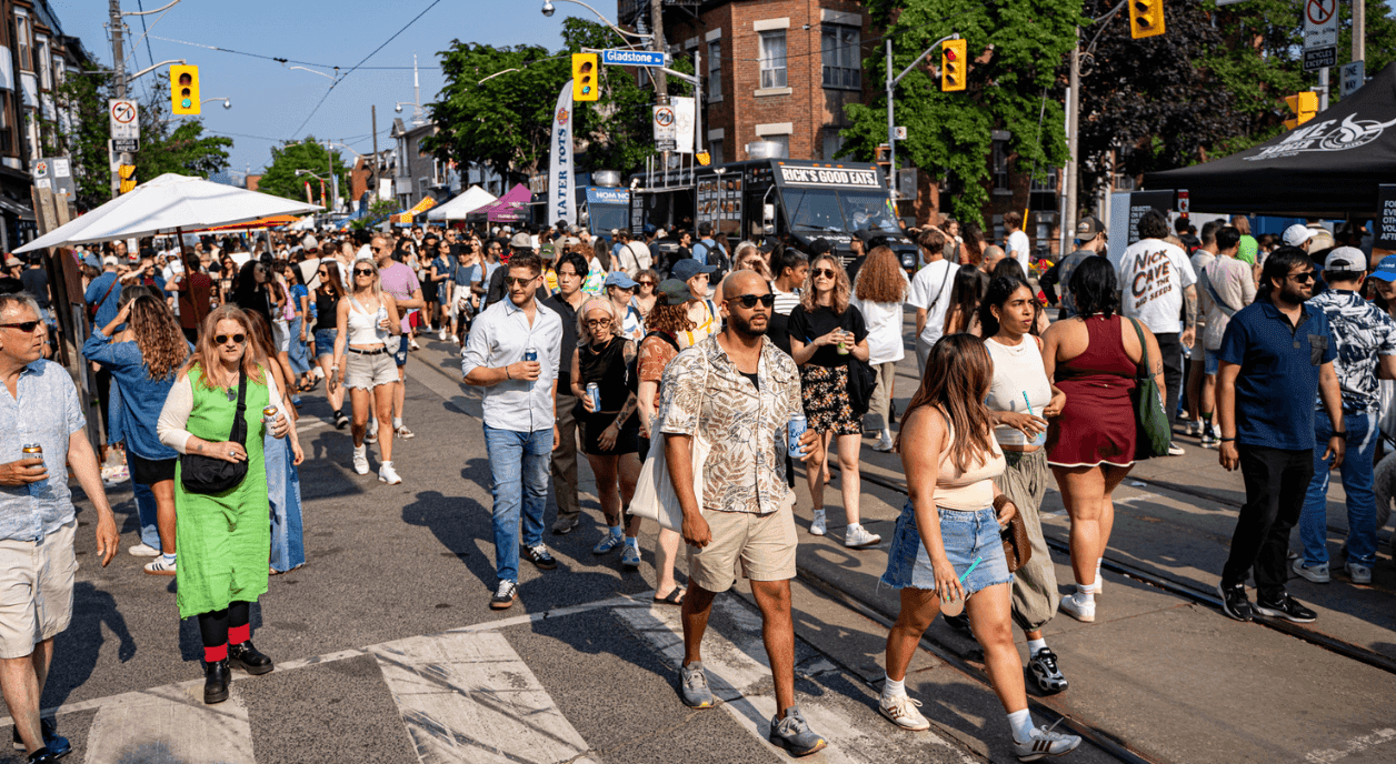 A crowd of people on the streets during a festival.