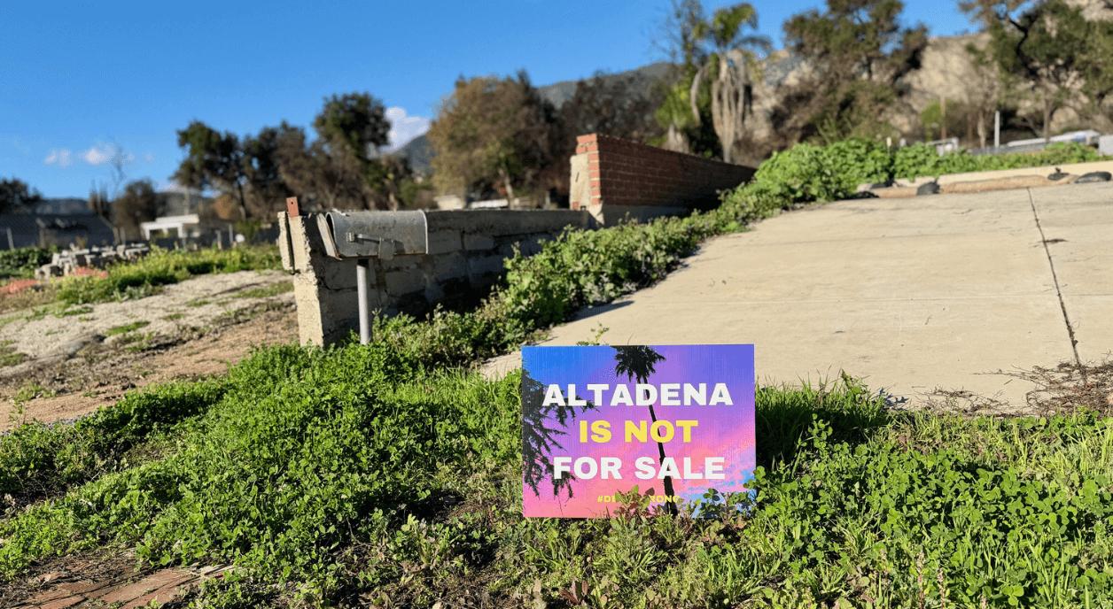 An affected area in California with the sign "Altadena is not for sale."
