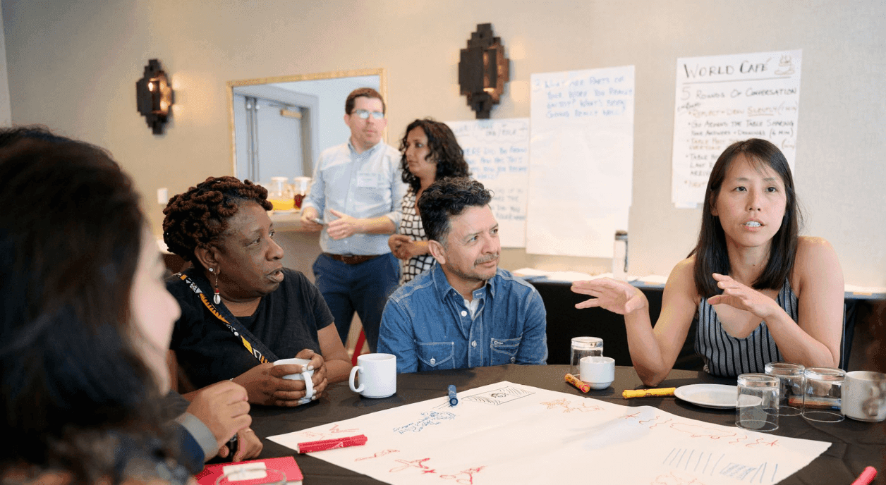 Members of the Mosaic Environmental Fund in a meeting.