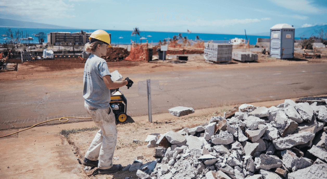 A construction worker at the site of the Maui wildfires.