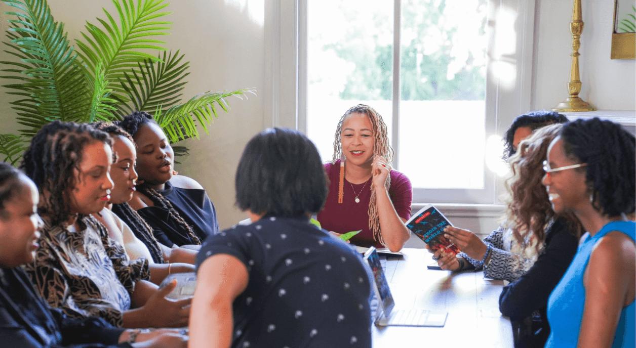 A group of women meeting to evaluate their nonprofit program.