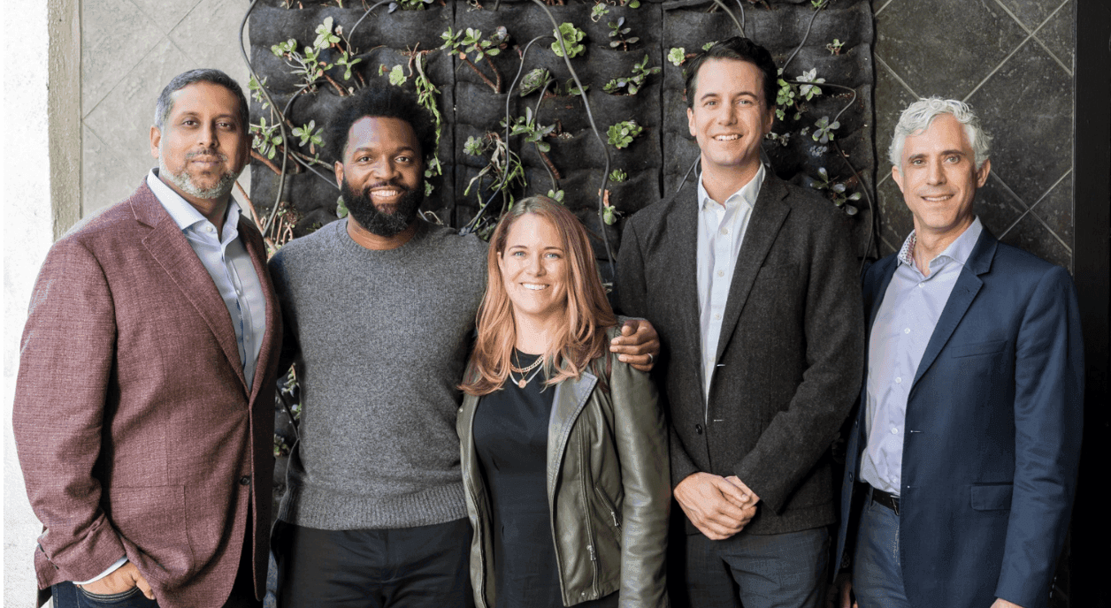 Authors of this article standing with colleagues.