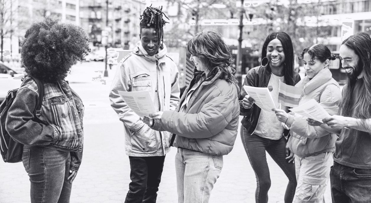 A diverse group of LGBTQIA+ volunteers in New York City.