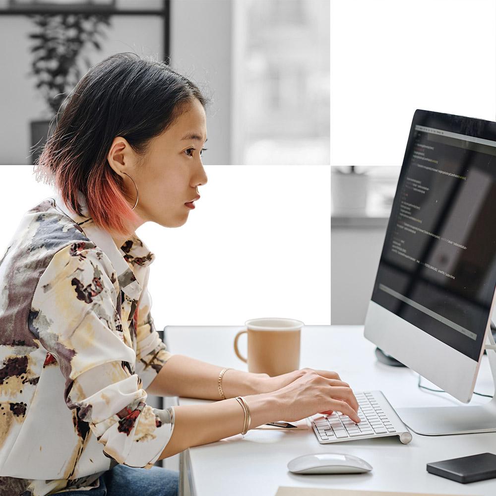 Woman using nonprofit data on computer
