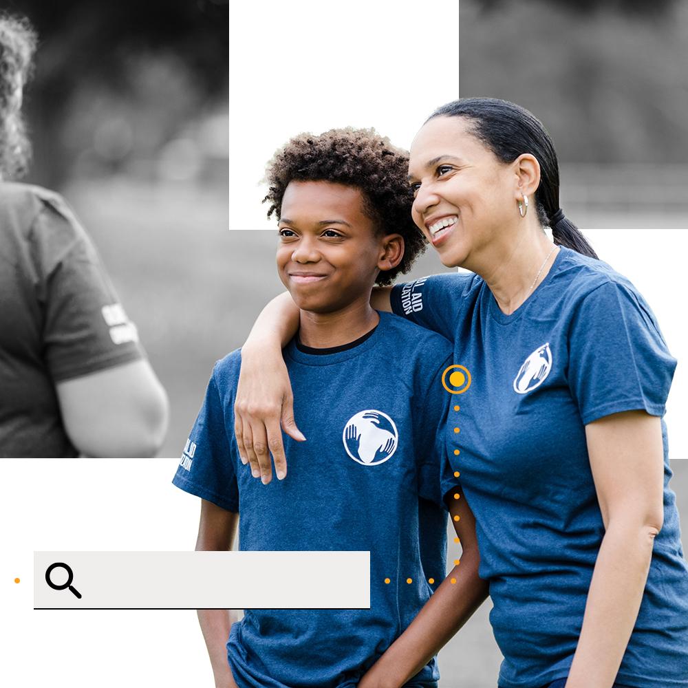 A mother and son volunteering together.