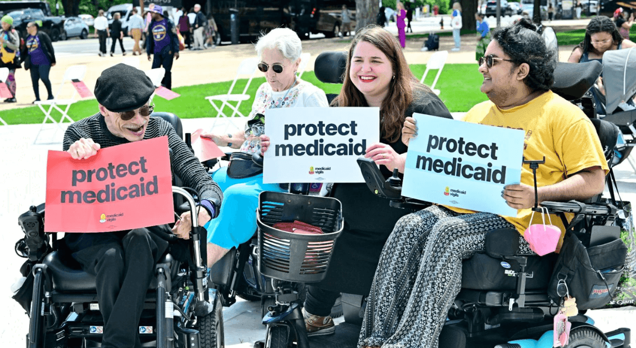 Four people in wheelchairs advocate to protect Medicaid.