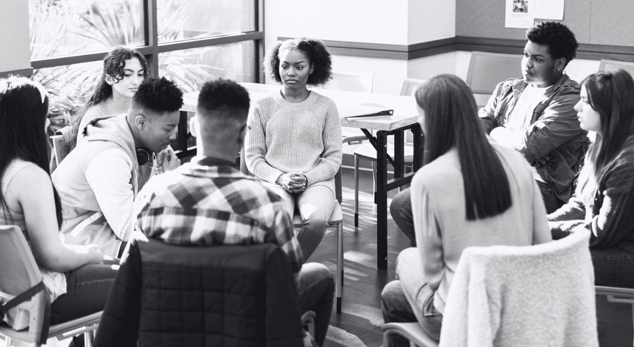 A group of nonprofit workers talk about how to collaborate together.