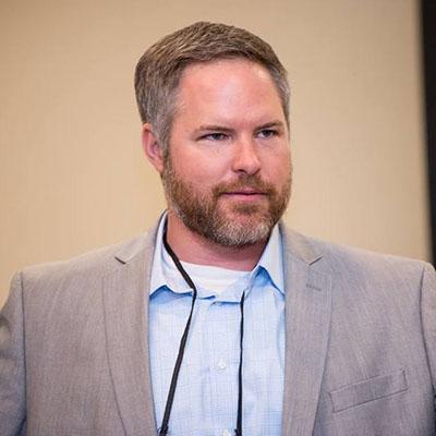 Headshot of Patrick Sweeney.