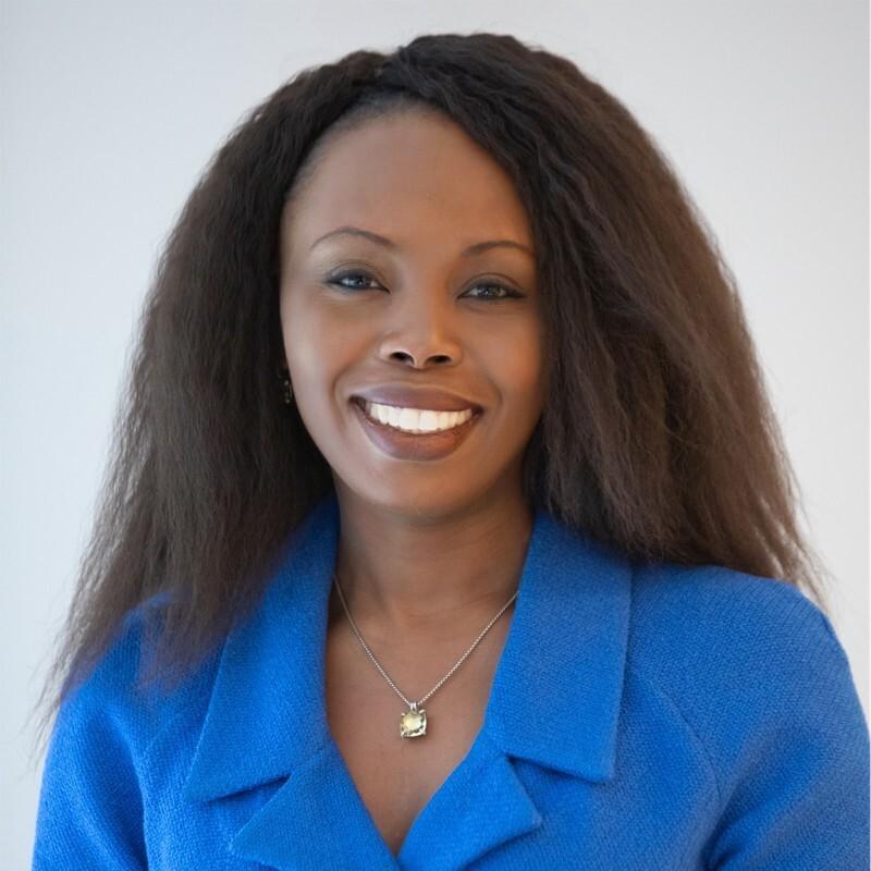 Headshot of Abigail Epane-Osuala, president of the GE Healthcare Foundation, in a blue shirt.