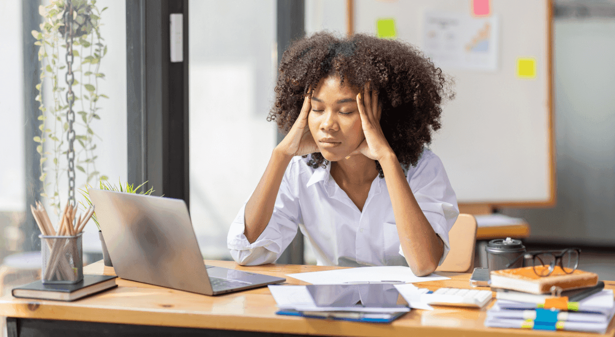 A young Black woman feeling burned out at a nonprofit.