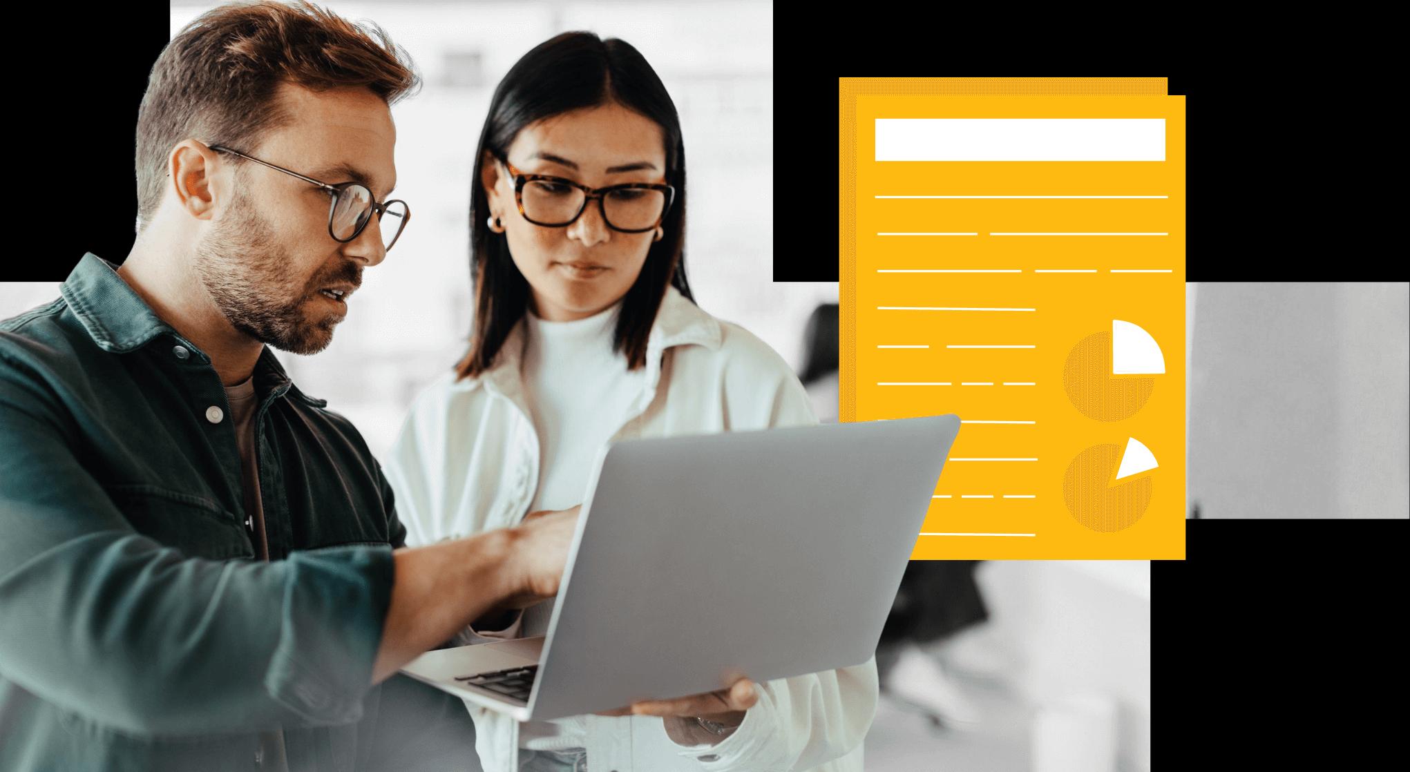 Two colleagues looking at grant applications.