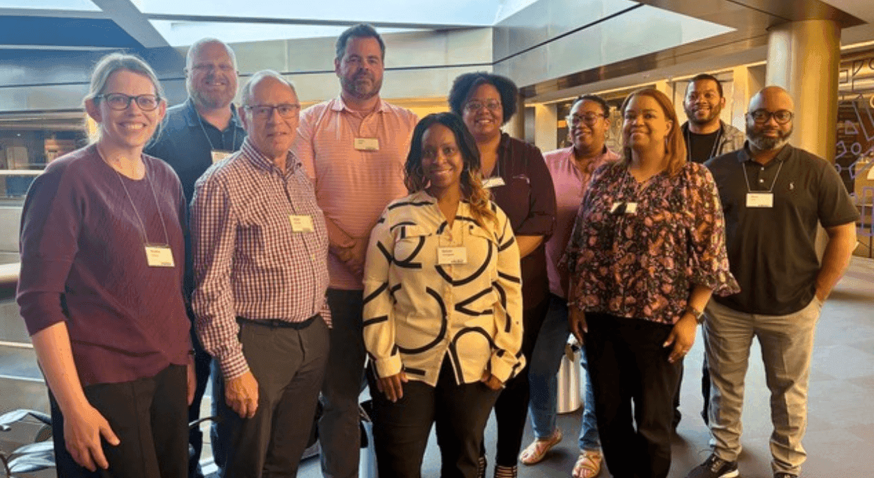 Group photo of staff from The Acuity Lab and a client nonprofit.